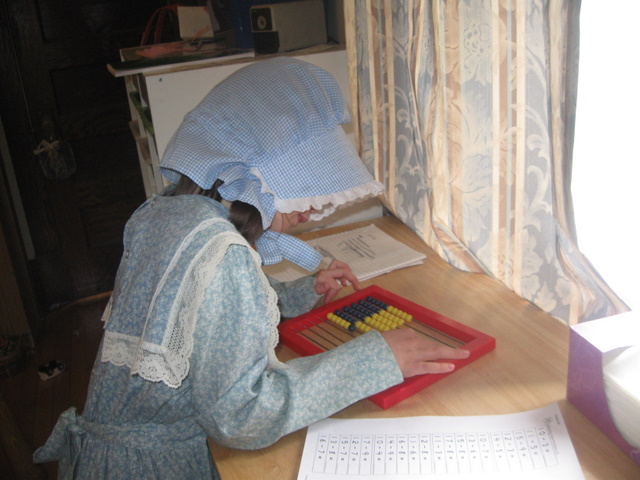 Miss M with our RightStart Abacus